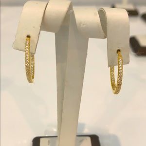 Sterling silver with cubic zirconium hoop earring